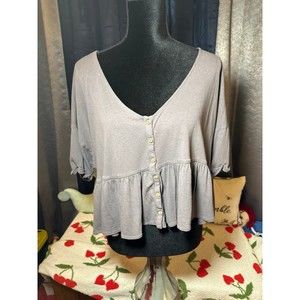 Out from under oversized cropped top